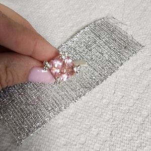 White and pink silver ring